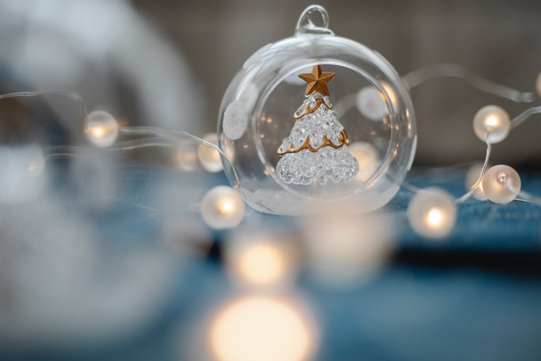 glass ball with decorative christmas tree